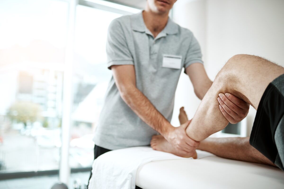 A pain management specialist examines a patient with Sciatica in calf pain and conditions.