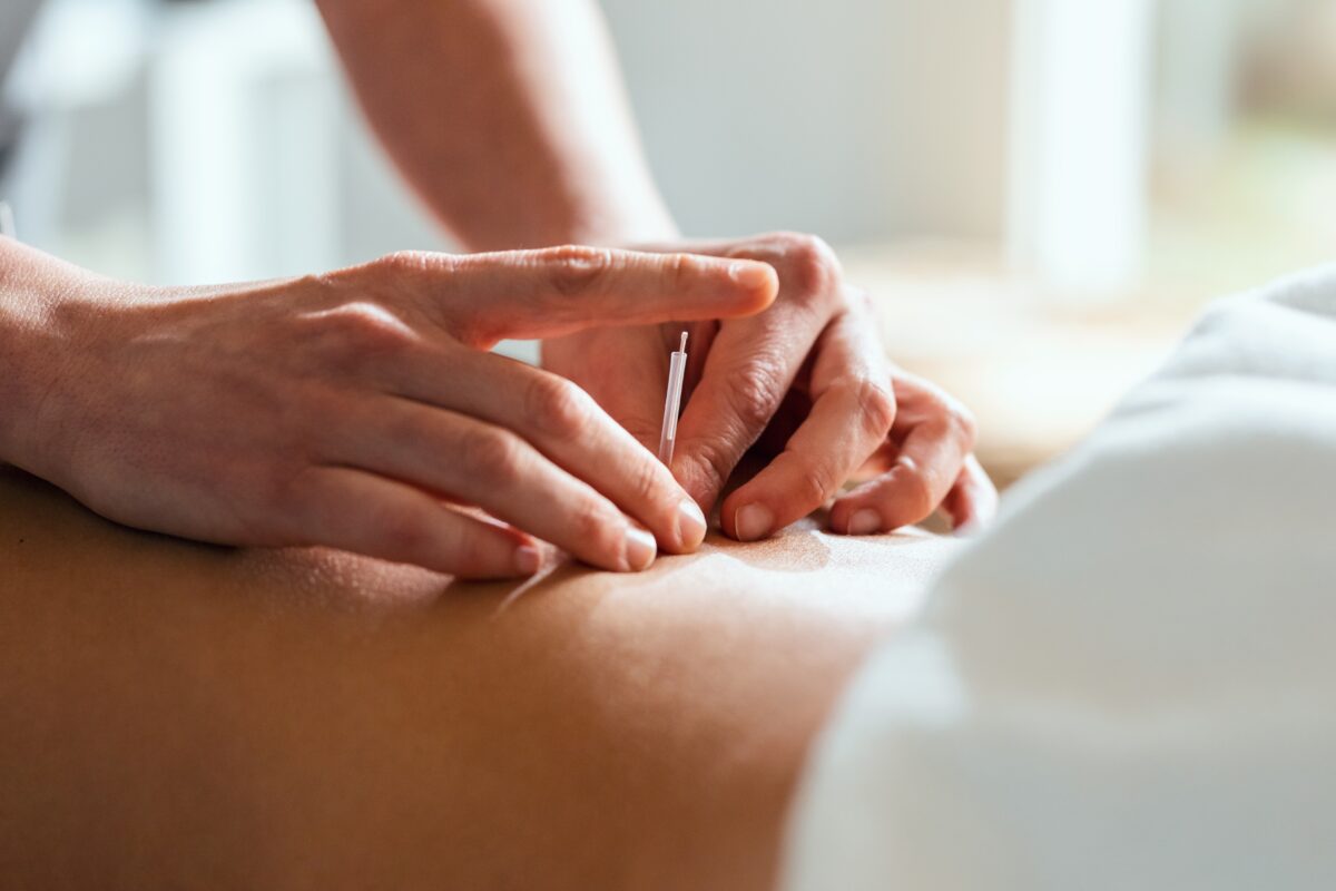 A patient receiving helpful trigger point injections from a pain management specialist.