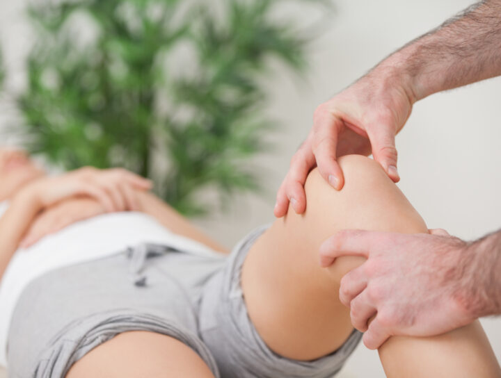 Painful thighs have common causes and warning signs, with treatment usually ensuing, as illustrated by this leg doctor treating a male patient.