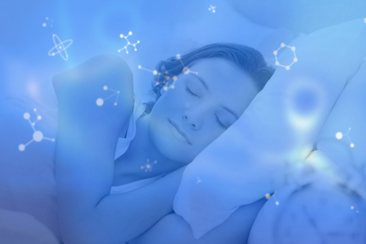A woman who has used an at home sleep study and benefited from apnea treatment restfully sleeps on her bed pillow.