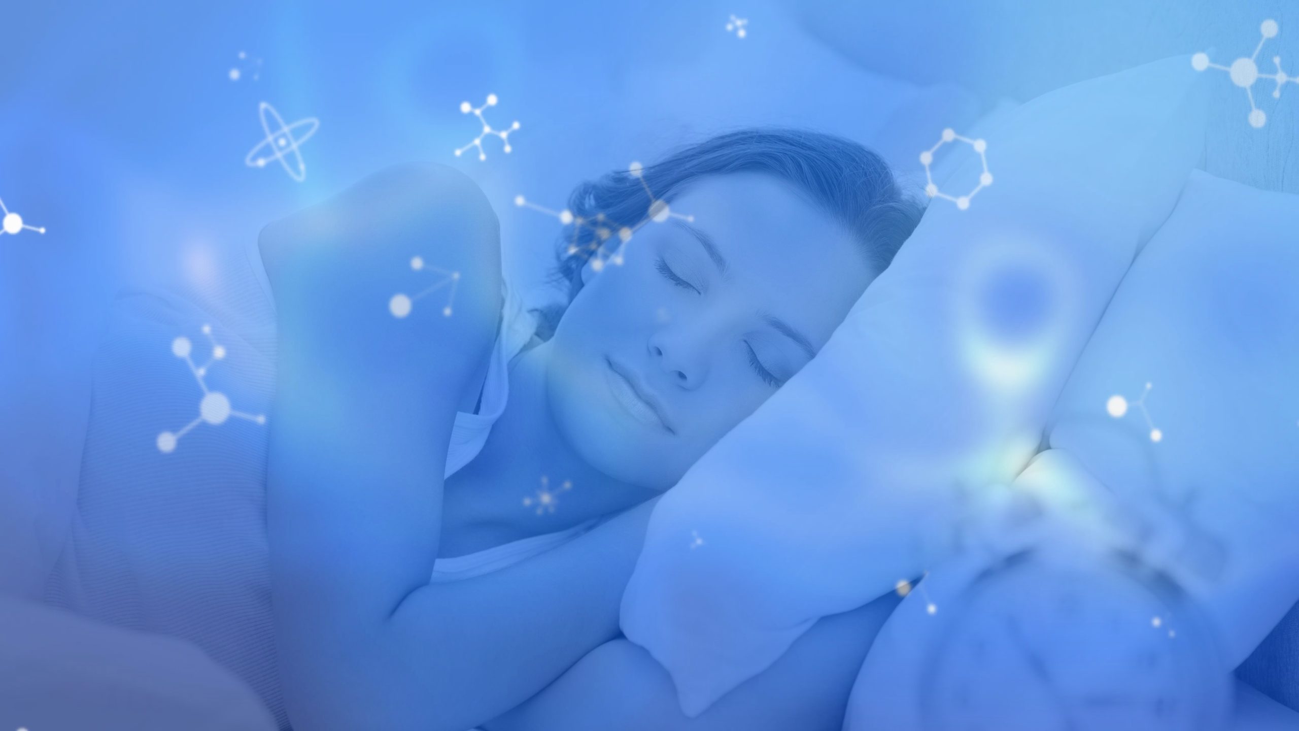 A woman who has used an at home sleep study and benefited from apnea treatment restfully sleeps on her bed pillow.